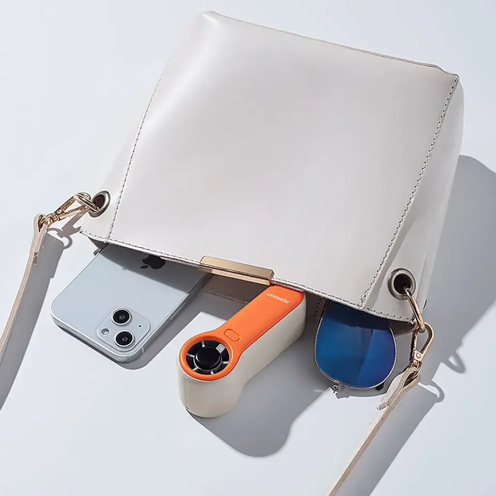 Porodo Lifestyle Pocket Size Handheld Fan - White/Orange