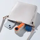 Porodo Lifestyle Pocket Size Handheld Fan - White/Orange